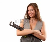 5034566-pretty-smiling-plumber-with-the-adjustable-wrench-isolated-on-white.jpg