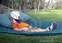 boy-sleeping-hammock-5090586.jpg