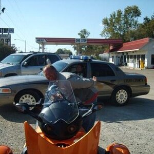 Tony with Cops on orangespydie girls bike