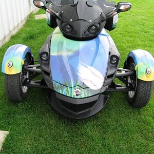 My riding buddies named the front trunk to the 'Frunk'. There is an silhouette of a batter swinging at a ball in the moonlight