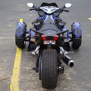 no fender, hindle exhaust (now dual 2 bro carbon fiber) ultra windshield, no magic neons spiked axle covers, custom wrap job, neon lights on bottom si