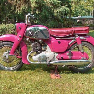 1960 Honda CA95 'Tokyo Rose' Benly
A rare example of the early version 150 cc Benly touring.  Factory pink color was an attempt to attract women rider