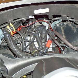 Starcom1 comm system installed under dash.  Radio and MP3 player cables in trunk.