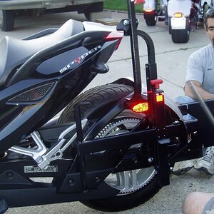 Mels installing hitch wheelchair rack