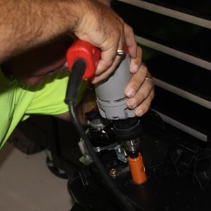 Drilling the 1 1/8" hole for the accessory kit.