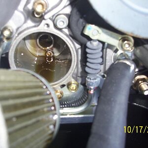 You can see the reverse lever here. I put a few drops of oil on the cable end and inside the bellows. It works a little smoother now.