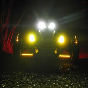 HID Lights.  55 watt, 6,000K headlights and 35 watt 3,000 K fog lights.