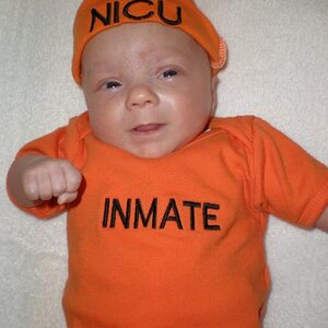 This is the outfit we did for the birth announcement given her 79 days in the NICU.