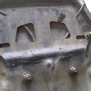 Across the lower portion behind the licence plate