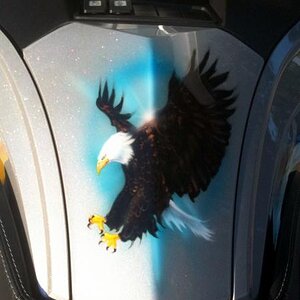 We love the detail he placed into the talons and feathers!