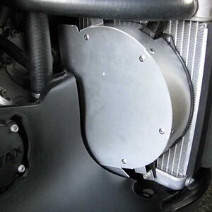 Put Fan Can in and slide the notches between the loosened bolts, then tighten the bolts.