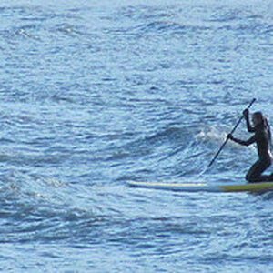 Club Ride #7  Surfing the boar tide on Turnagin Arm.  It's cold water and dangerous tides.  Notice the wet suit.  Not for beginners--but there are a f