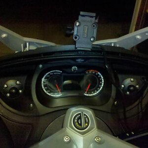 Working on adding the mods 
Added 2 ram mounts where the analogue gauges were
Right side for Rear View Camera LCD
Left side for Much Desired Cup-Holde