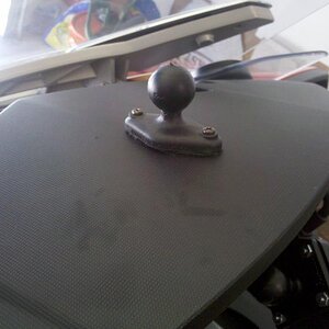 Ram ball mounted to top of dash. I also put heavy duty velcro in between the mount and the dash to help absorb some of the vibration, & it seems to ha