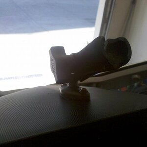 Empty Ram Mount attached to top of dash