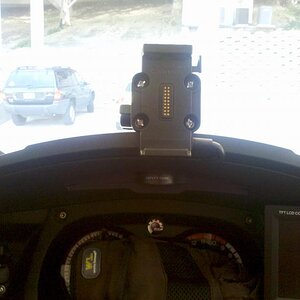 Empty Garmin cradle on top of dash