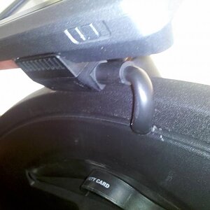 Showing where the wire comes thru the lip of the dash