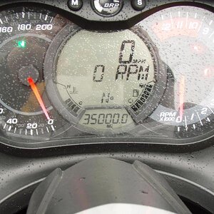 SpyderDeb reaches 35K miles on the wet way home