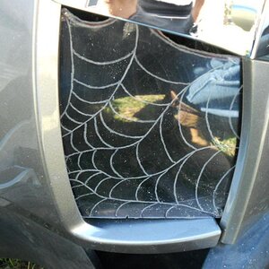 Needs to be cut along outside edge of web to seat right, Held in by panels, no screws and no complete panel removal, just pull top section back and sl