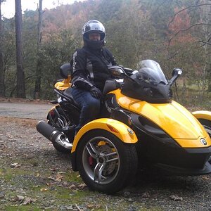 Me and my 2009 RS (mileage 3500, purchased new in 2011, added riser, adjustable back rest, yellow underlighting, brake cap covers, auto hood latch, 12