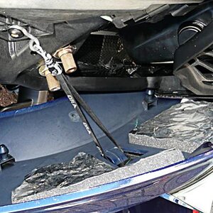 Upper left side panel tether