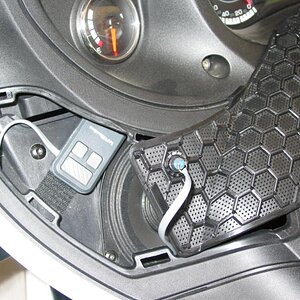 Remote velcro'd within speaker cavity