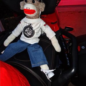 He wears a custom Spyderfest t-shirt in this shot.