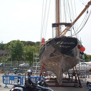 6 + in front of a military ship 15p