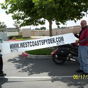 Dudley accepting the banner, San Marcos, CA