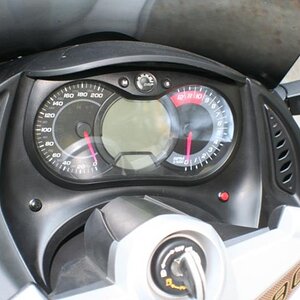 Two little buttons Black to open Truck, Red to open Garage door.