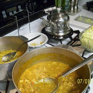 Crawfish etouffe, corn macque choux, potato salad