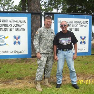 Homer (Dudley's brother) & Dudley at the armory, Abbeville, LA.