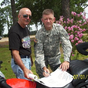Homer & Dudley with the banner