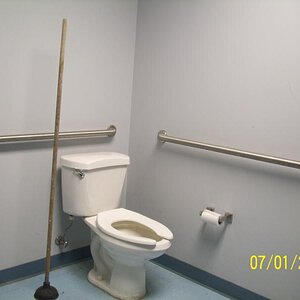 Wouldn't touch it with a 10 foot pole. This is the facility at the Aromory; wonder why the very long handle? I didn't ask!  LA Army National Guard, Ab