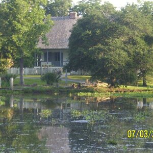 Vermillionville house with pond, Lafayette, LA.