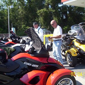 Looking.  Dudley about to adjust the parking brake.