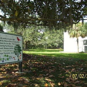 Aviary (white structure) explaination on the sign.