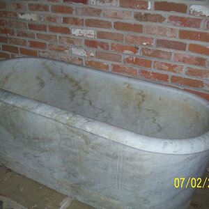 1,000 pound marble tub.