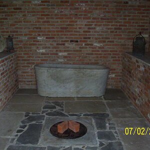 This is the buttery; well in center was 8 feet deep and used for cold storage of butter and milk.