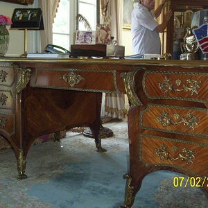 Desk; was told the details but I didn't have my trusty pen and paper during the tour because we weren't expecting to see inside. The front shows fake 