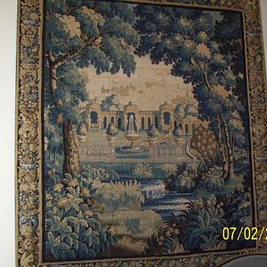 A tapestry depicting something about a small house where Josephine or such lived, she didn't like the palace (in France) so was quartered in a smaller