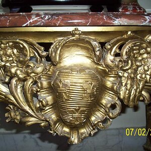 Napoleon symbol. He used bees so here is the beehive decorated with fleur-de-lis. The open wing signifies victory, the closed defeat.