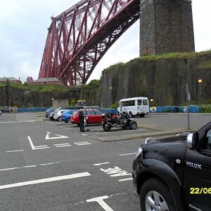 Wife and Spyder under the Forth Rail Bridge Scotland