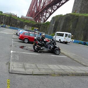 Wife and Spyder under the Forth Rail Bridge Scotland