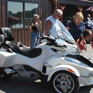 One of the new riders gets checked out on her bike by Len Damouth