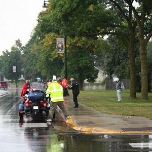 Putting rain gear on in Pierz, MN