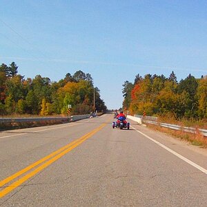 These folks took time out from fishing to wave as we rode past.