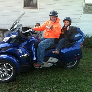 My Grandson Garrett and I. He got the first ride. He didn't want to stop......neither did I. The smile on his face.......priceless.