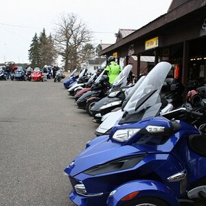 14 Spyders and 4 motorcycles all lined up at Caswell Cycle, Mora, MN - quite a nice gathering for the weather!