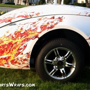 Side photo of RT622 trailer with our Flames applied.  PowerSportsWraps.com